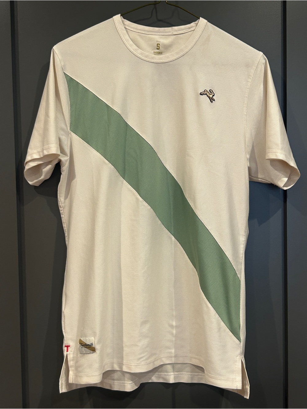 Tracksmith White Short Sleeve Performance Tee with Green Diagonal Stripe